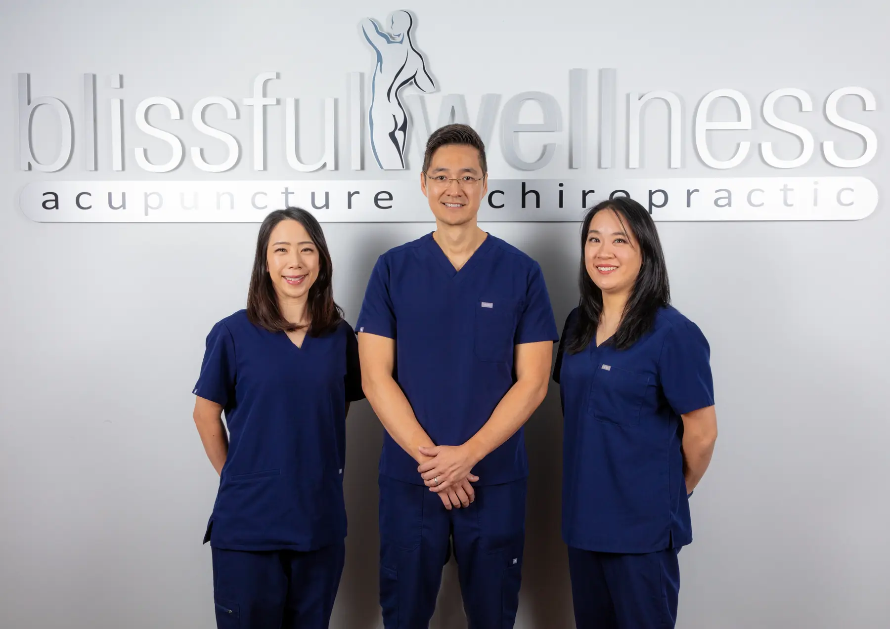 Blissful Wellness doctors providing collaborative acupuncture and chiropractic care